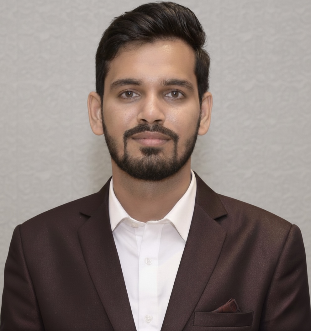 Professional headshot of software engineer in casual business attire